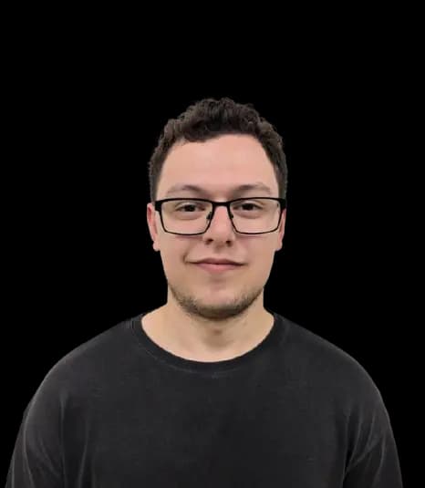 A portrait picture of Eray with Manchester city skyline as the background.